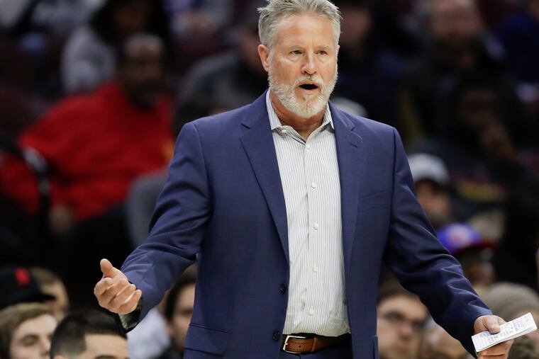 Sixers coach Brett Brown during the victory over the Toronto Raptors on Saturday. (YONG KIM / Staff Photographer)