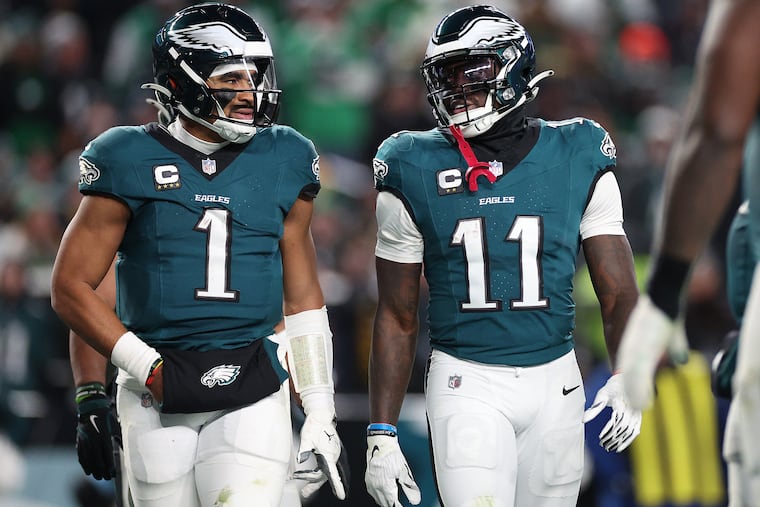 Eagles quarterback Jalen Hurts (left) and wide receiver A.J. Brown connected early and often on Sunday against the Steelers.