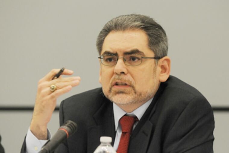 Pedro Ramos presides over his first Student Reform Commission meeting in November at School District headquarters. (Sarah J. Glover / Staff Photographer)