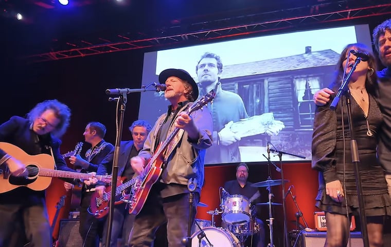Eddie Veddie with Charlie Hall to his right and Imelda Mae to his left in a tribute to the late Glen Hansard at the Dublin concert hall Vicar Street.