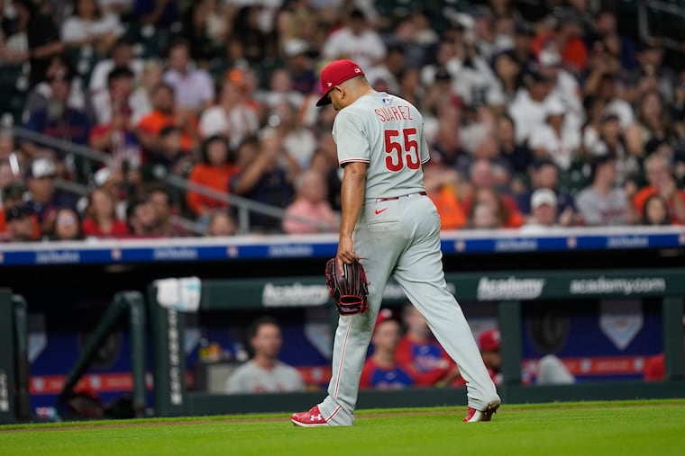 Phillies starting pitcher Ranger Suárez walks to the dugout after being pulled during the eighth inning.