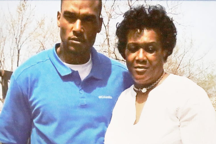 Phillip White (left) and his mother Pamela White in a photo taken on Mothers Day 2014.