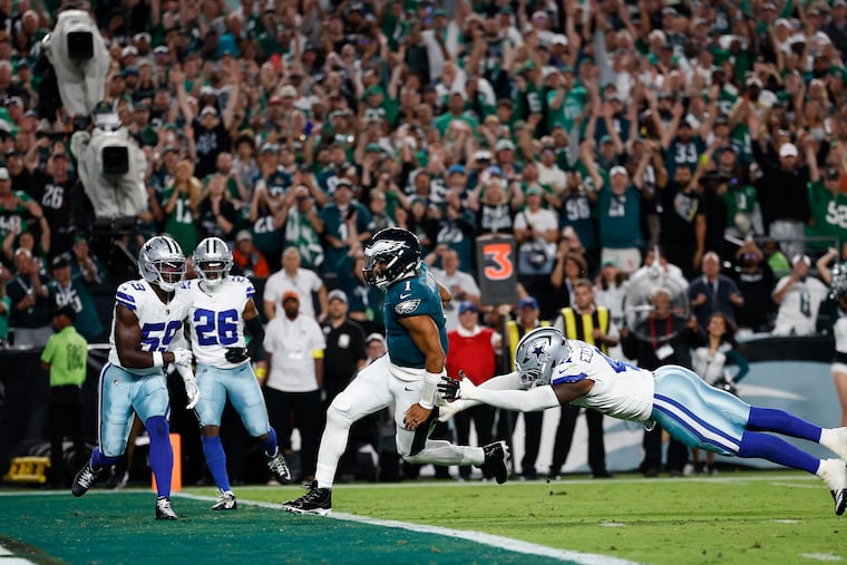 Jalen Hurts scores a first-quarter touchdown during the team's season-opening win over the Cowboys.