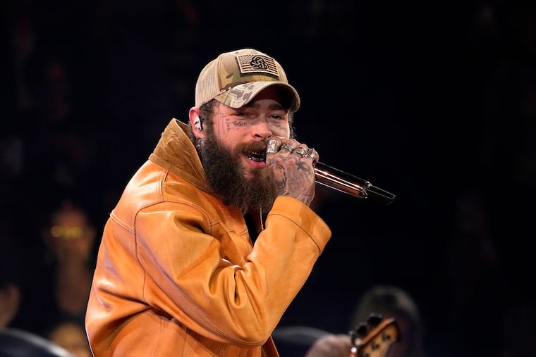 Post Malone at the CMA Awards in 2023, in Nashville, Tenn. The rapper and country singer will headlined 'The Big Big Ass Stadium Tour. which is coming the Citizens Bank Park in 2025 with Jelly Roll and Sierra Ferrell. (AP Photo/George Walker IV, File)