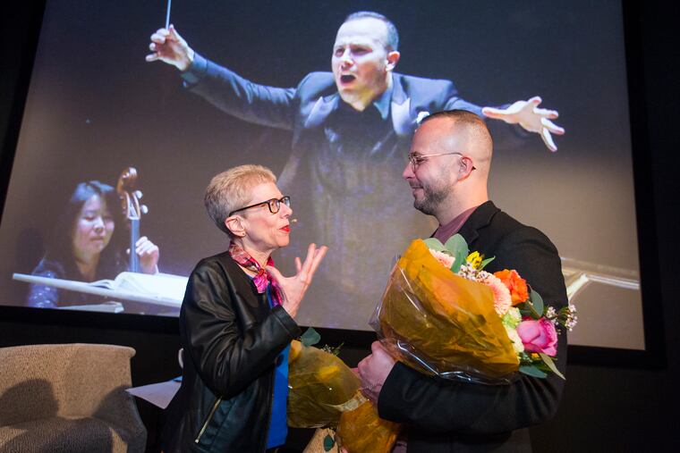 Terry Gross, left, and Yannick Nézet-Séguin talk after an interview for Fresh Air in front of a live audience Tuesday night at WHYY.