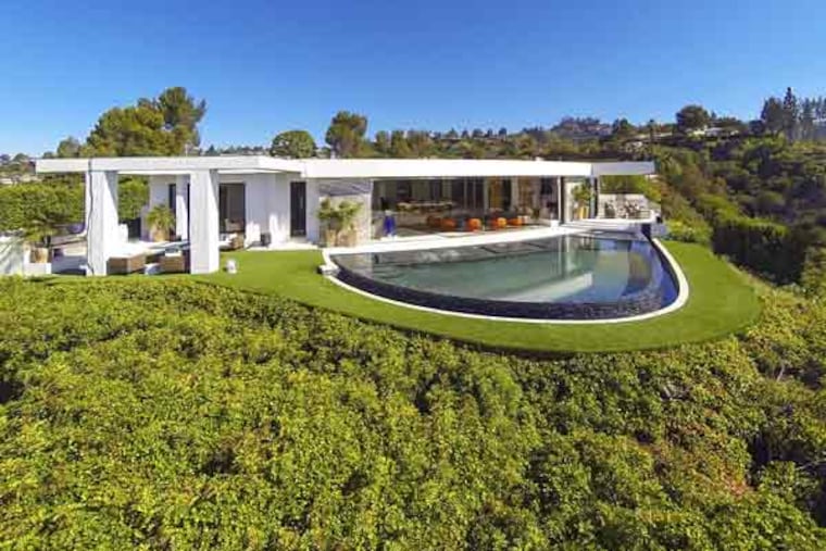 A 23,000-square-foot contemporary home in Beverly Hills, Calif., is being shopped off-market at $85 million. (Simon Berlyn/MCT)