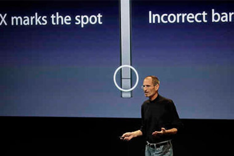 Apple CEO Steve Jobs addresses the iPhone 4's antenna problems Friday in Cupertino, Calif. (Associated Press photo)
