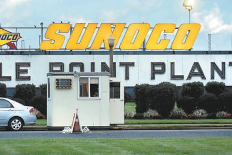 The Sunoco Eagle Point oil refinery in Gloucester County, the morning after the company announced furloughs of its 400 employees and the shifting of production to refineries in Philadelphiaand. ( Tom Gralish / Staff Photographer )