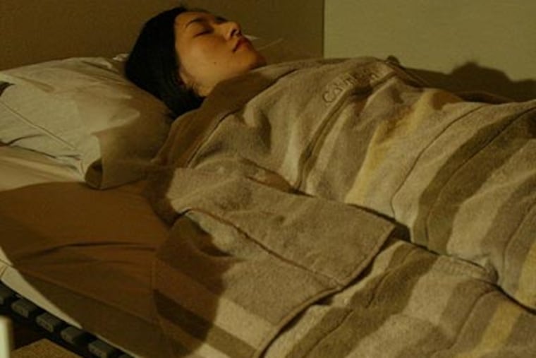 While the study does give us a reason to reexamine the chronic use of sleep medication (especially in folks with serious underlying health problems), this study has enough flaws to let us sleep a bit easier at night. (AP Photo/Shizuo Kambayashi)