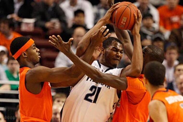 Villanova's Markus Kennedy gets surrounded by Syracuse players on Wednesday night. (Ron Cortes/Staff Photographer)