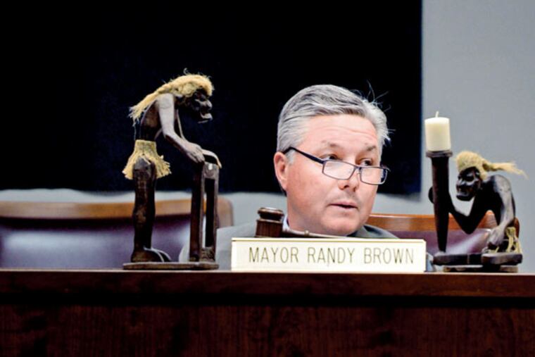 Evesham Mayor Randy Brown presides over the council meeting March 17, 2015. ( TOM GRALISH / Staff Photographer )