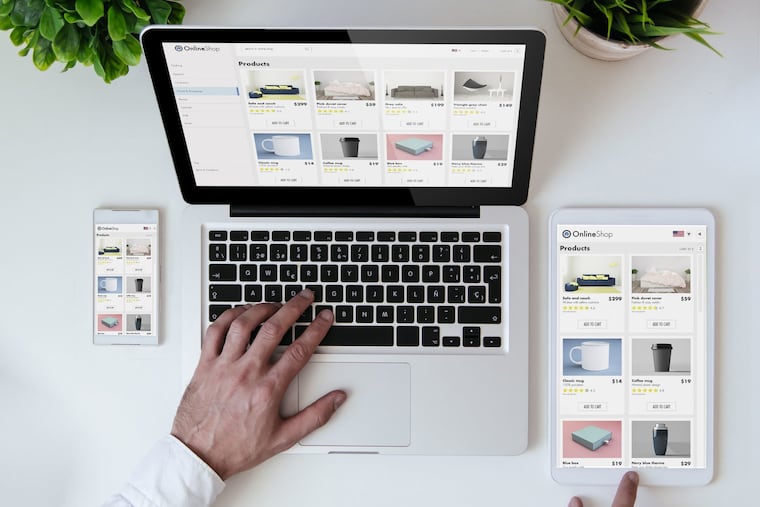 In this stock photo, a person reviews a website on a laptop, tablet, and smartphone. It's important to make sure your company's website can be used by people with disabilities, Gene Marks writes.