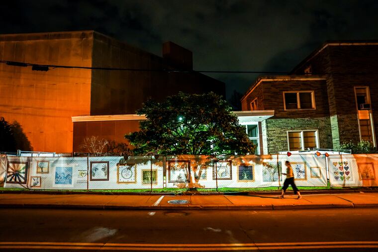 Artwork is seen on a fence around the Tree of Life synagogue in Pittsburgh, site of the 2018 mass killing that was the deadliest act of antisemitism in U.S. history.