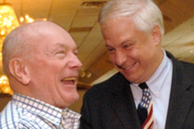 Al Taubenberger shakes hands with Paul Andris at a meeting of local Republicans at the Canstatter in Northeast Philadelphia.