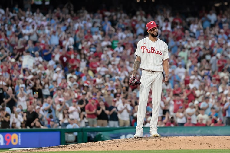 Cristopher Sánchez pauses on the mound to receive applause from Phillies fans after his scoreless streak ended in the seventh inning.