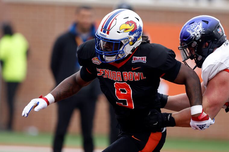 National team defensive lineman Lonnie Phelps of Kansas participates in drills during practice for the Senior Bowl on Thursday.