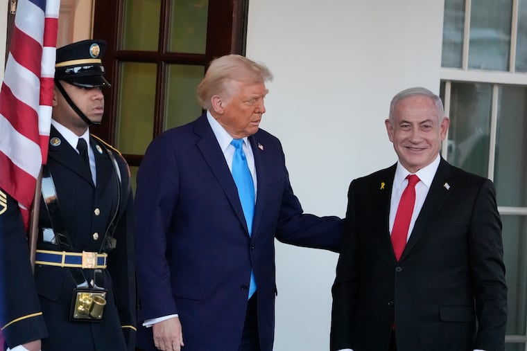 President Donald Trump greets Israeli Prime Minister Benjamin Netanyahu as he arrives at the West Wing of the White House on Tuesday.