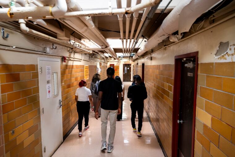 Camden schools Superintendent Katrina McCombs and others are given a tour of Eastside High School (formerly Woodrow Wilson High School).