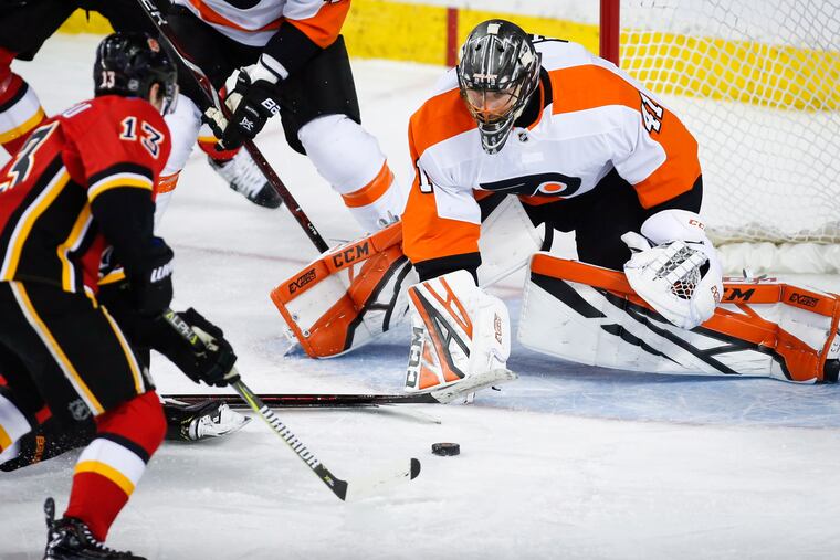 Anthony Stolarz (right) thwarted many of the Flames' best chances on goal on Wednesday, despite the Flyers losing 6-5.