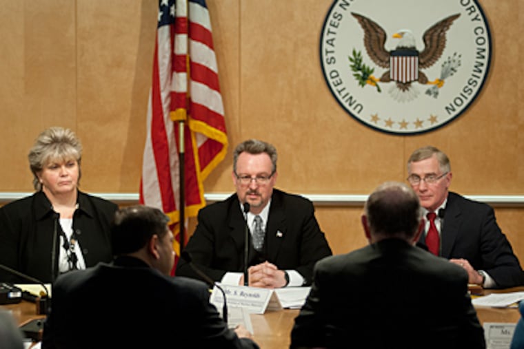 Steven Reynolds, Director, Division of Nuclear Materials Safety, Region III (center), asks questions of the Veterans Administration Medical Center, Philadephia, staff during the US Nuclear Regulatory Commission hearings, Dec.r 17, 2009, on the brachytherapy mistakes made at the Philadelphia Veterans Administration.