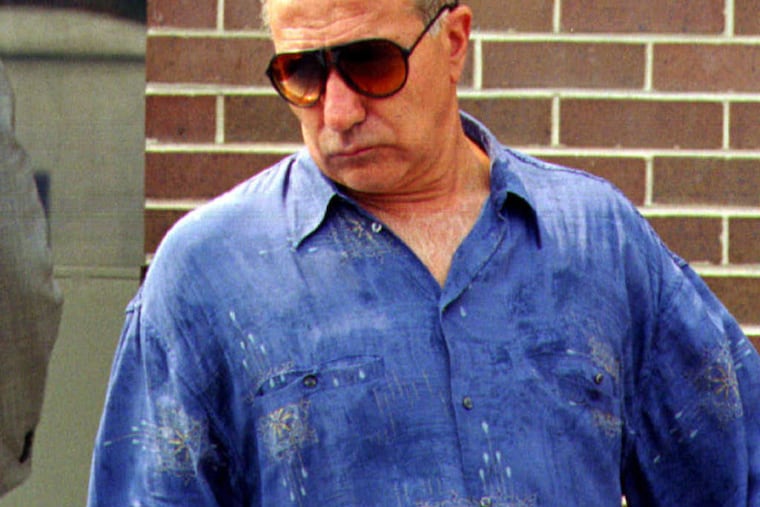 John Stanfa leaves a Warfield Street pizza shop in August 1993 to visit his hospitalized son, who was wounded in an assassination attempt on the mob boss.