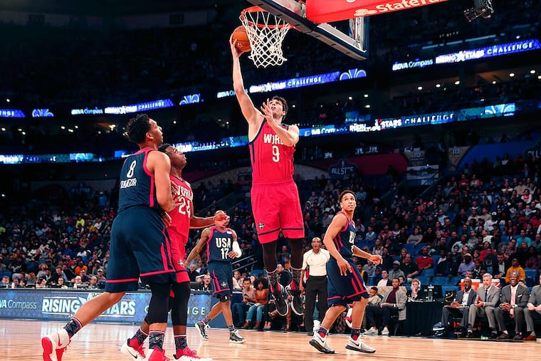 World forward Dario Saric (9) of the Philadelphia 76ers goes to the basket during the Rising Stars Challenge, part of the NBA All-Star events in New Orleans, Friday, Feb. 17, 2017.
