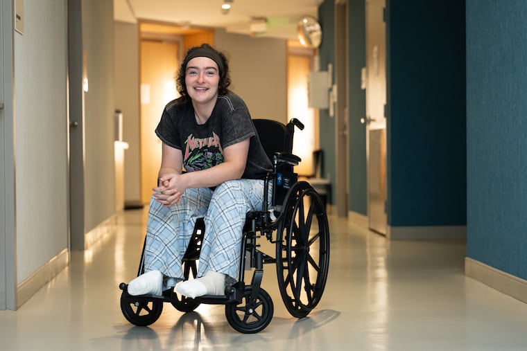 Alexis DiBella, 31, a resident at Public Health Management Corporation’s medical respite facility in West Philadelphia, at the facility in April. DiBella was hospitalized for frostbite while living outside and, after undergoing a partial foot amputation, became a resident at the respite center in January.