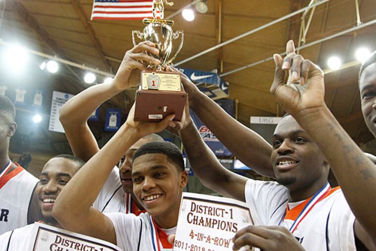 Chester celebrates with its trophy after defeating Pennsbury. (Ron Cortes/Staff Photographer)