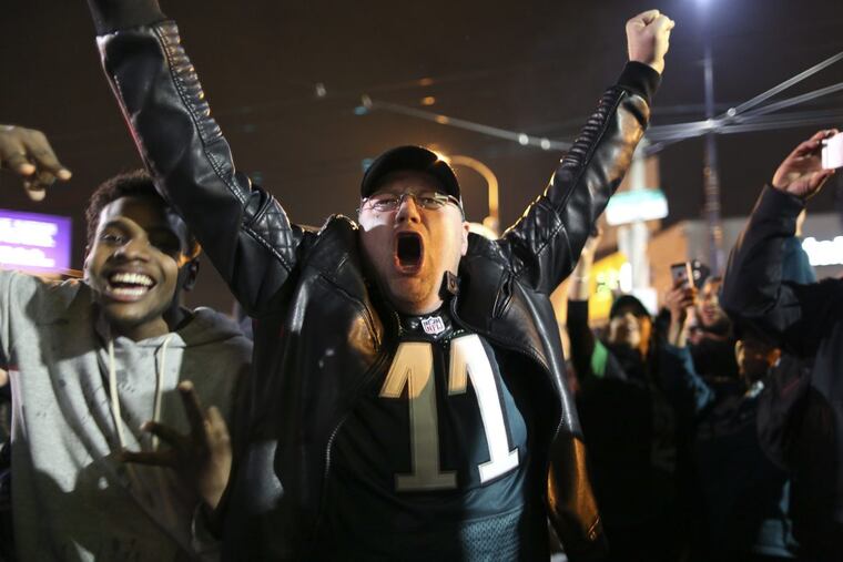 Fans celebrating the Eagles NFC championship on Sunday, Jan. 21.