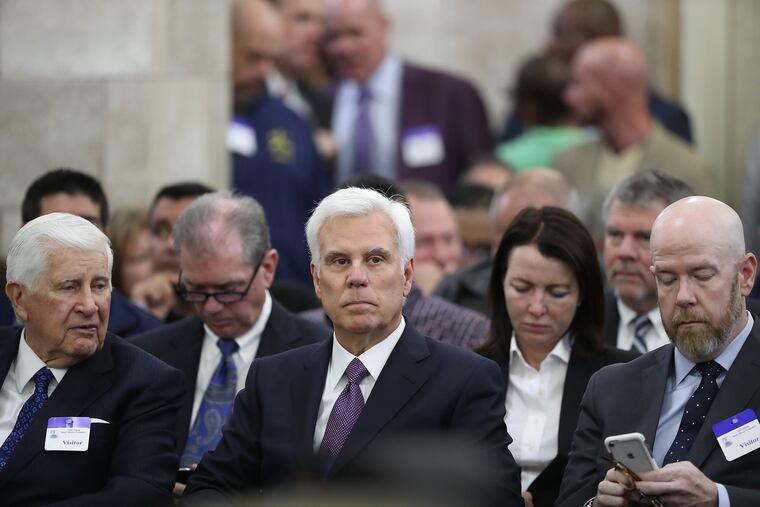 George E. Norcross III (center) waits to testify before the N.J. Senate Select Committee on Economic Growth Strategies in Trenton on Nov. 18, 2019.
