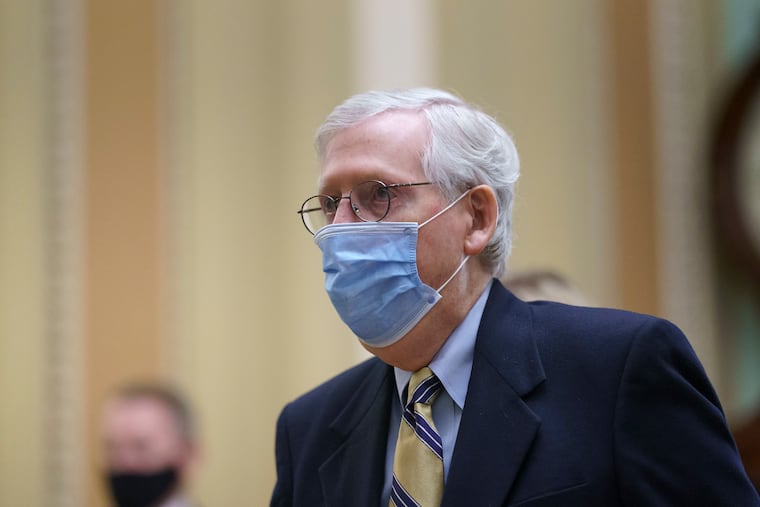 Senate Minority Leader Mitch McConnell (R., Ky.) returns to the chamber as the Senate voted to consider hearing from witnesses in the impeachment trial of former President Donald Trump, at the Capitol in Washington, Saturday, Feb. 13, 2021.