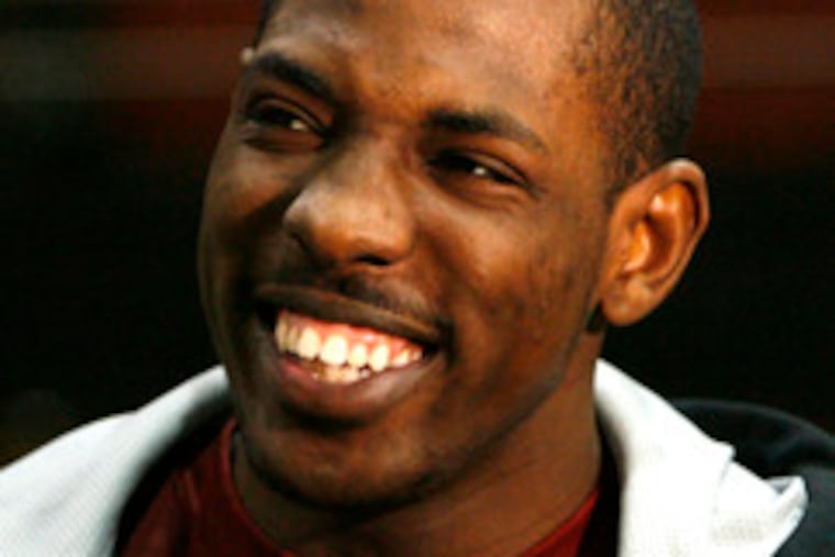 Ahmad Nivins of St. Joseph's is all smiles about the Hawks' trip to the NCAA tournament, where they will face Oklahoma.