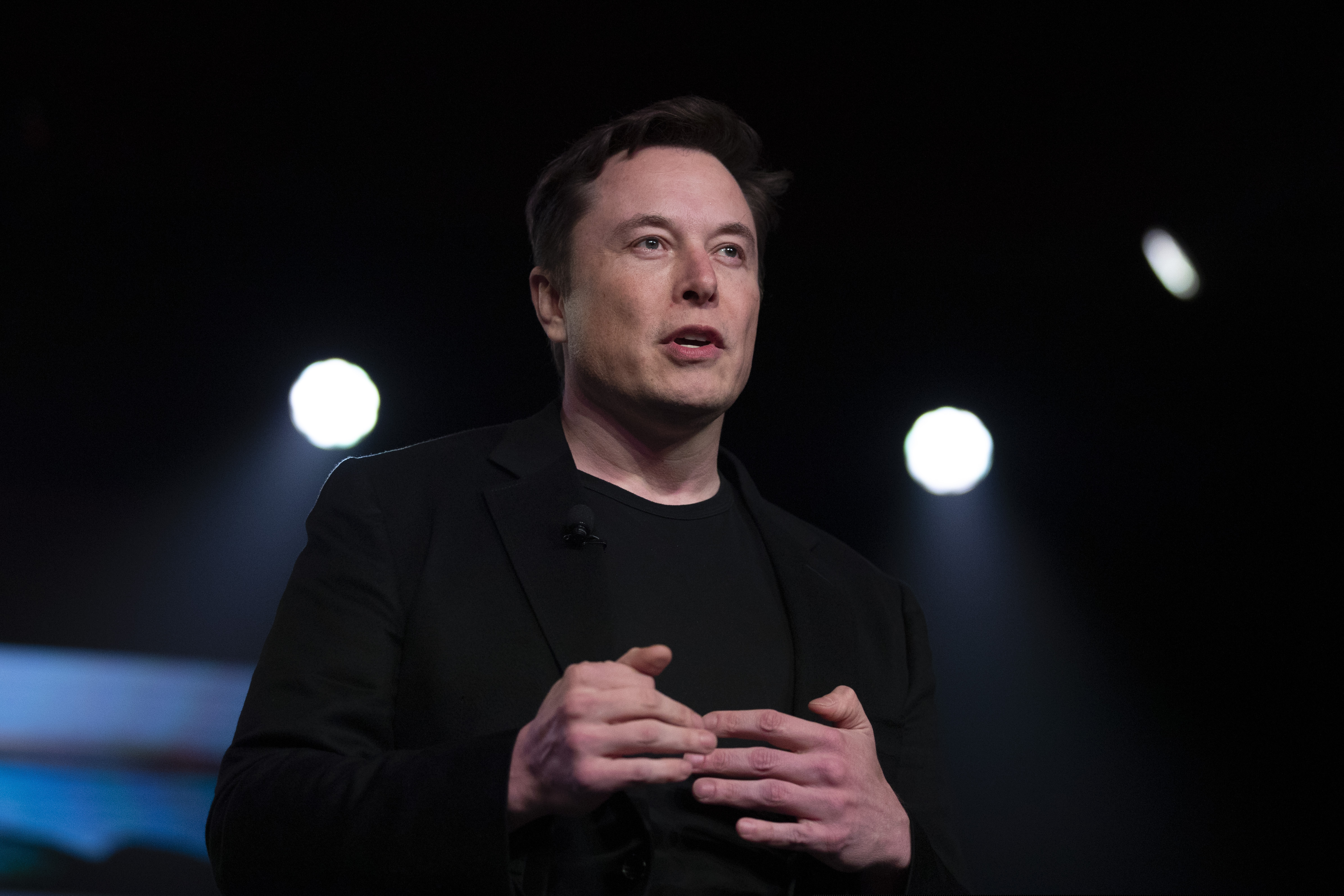 FILE - In this March 14, 2019 file photo, Tesla CEO Elon Musk speaks before unveiling the Model Y at the company's design studio in Hawthorne, Calif. Musk says he’s deleted his Twitter account 10 months after a tweet landed him in trouble with U.S. regulators. Musk changed his Twitter display name to Daddy DotCom on Father’s Day. Daddy.com is an actual website that provides parenting information to new and expecting fathers. (AP Photo/Jae C. Hong, File)