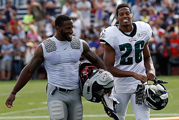 Eagles cornerback Cary Williams and the Patriots' Daxton Swanson. (Yong Kim/Staff Photographer)