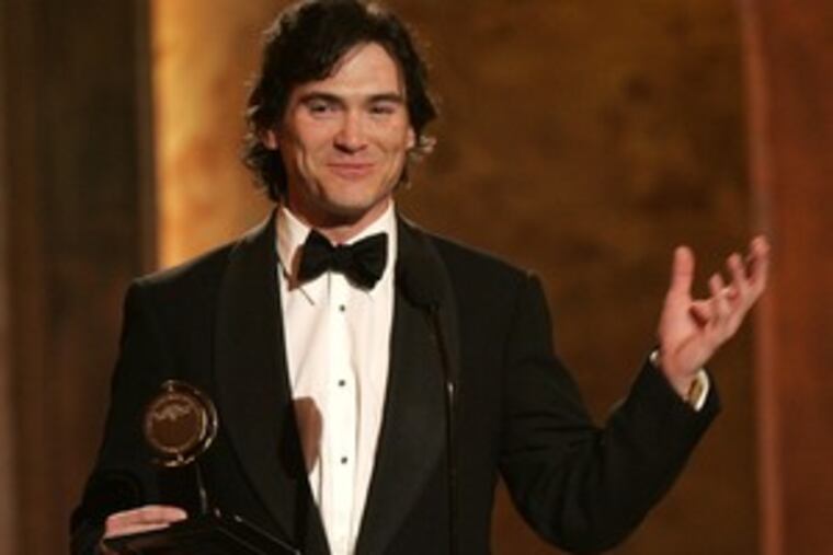 Billy Crudup holds his award for "The Coast of Utopia."He won for best performance by a featured actor in a play.