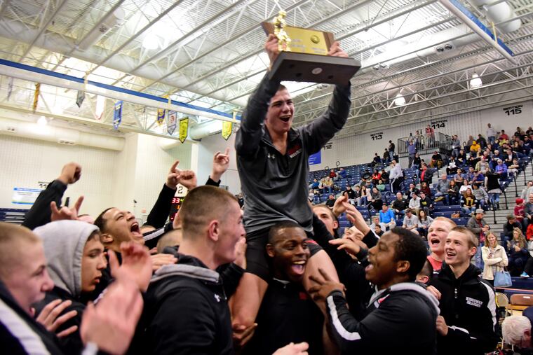 Cheney Kinner gets the hero's ride after Kingsway's victory in the Group 4 state-championship match.