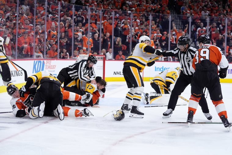 The Flyers and Penguins went at it in a wild second-period brawl that resulted in 222 combined penalty minutes.