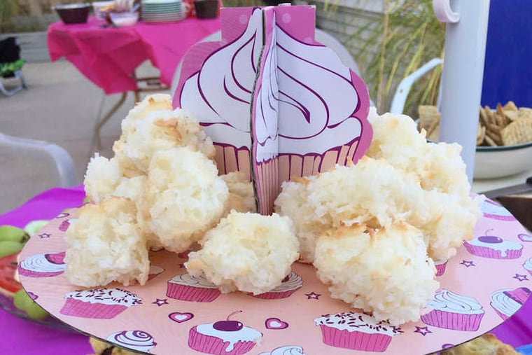 For Shore-vacation tea - the meal, not the drink - a platter of home-made scones and macaroons are served with finger sandwiches in Ocean City. ( Photo by Ellen Dunkel )