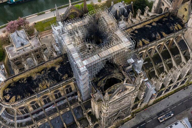 An image made available by Gigarama.ru on Wednesday April 17, 2019 shows an aerial shot of the fire damage to Notre Dame cathedral in Paris on Tuesday, April 16. (Gigarama.ru via AP)