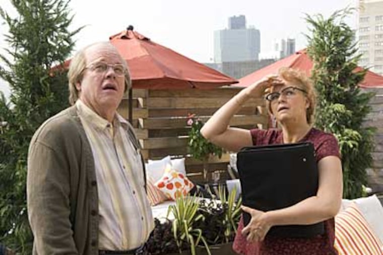 Philip Seymour Hoffman and Samantha Morton in "Synecdoche, New York," the directing debut by screenwriter Charlie Kaufman. The film examines the creative and emotional life of a film director, played by Hoffman.