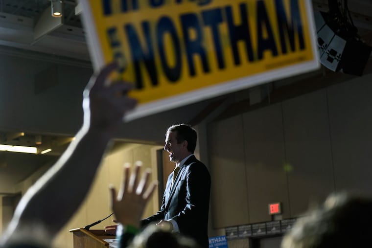 Democrat Ralph Northam takes the stage after winning the gubernatorial race in Virginia. Northam greets his supporters at George Mason University in Fairfax. Many are looking at the Virginia race as being a harbinger of what to expect in the midterm elections of 2018.
