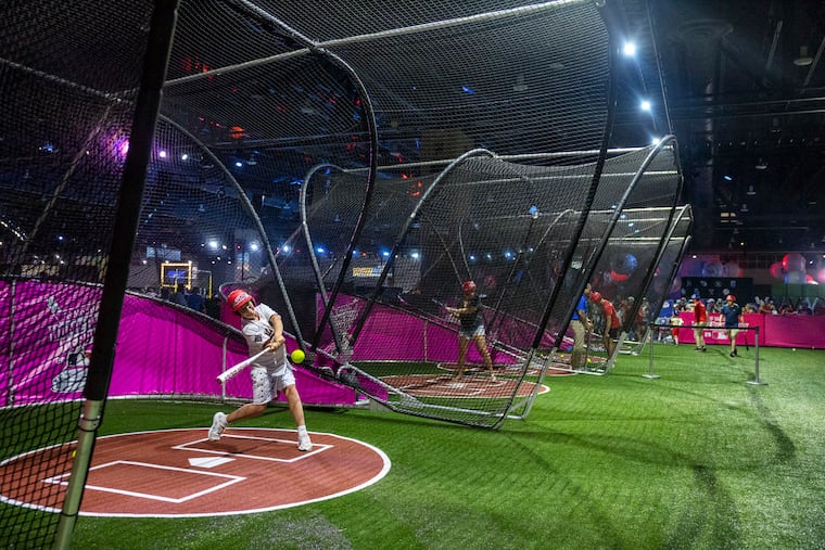 August McMahon, 10, of Washington, D.C., bats at the home run derby at the All-Star Village at the Pennsylvania Convention Center on Saturday.