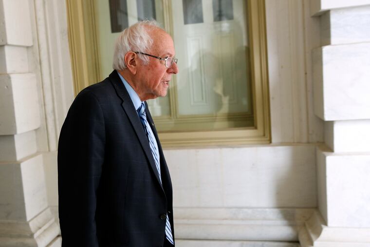 Democratic presidential candidate Sen. Bernie Sanders, I-Vt., leaving Capitol Hill in Washington on Wednesday after the Senate passed a second coronavirus response bill.