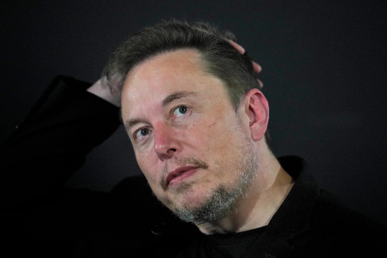Elon Musk appears at an event with Britain's Prime Minister Rishi Sunak in London in November.