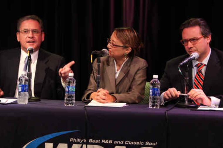 Incumbent Democratic City Controller Alan Butkovitz shakes his finger at GOP challenger Al Schmidt during a debate last week moderated by Loraine Ballard Morrill at Clear Channel Studios in Bala Cynwyd.