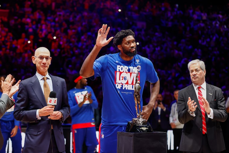 Sixers center Joel Embiid waves to fans during the NBA MVP Michael Jordan Trophy ceremony before the start of Game 3 of the NBA basketball Eastern Conference semifinals playoff series at the Wells Fargo Center, Friday, May. 5, 2023, in Philadelphia.