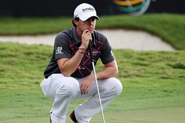 Rory McIlroy shot a final-round 8-over 80 to hand the 2011 Masters to Charl Schwartzel. (Lynne Sladky/AP)