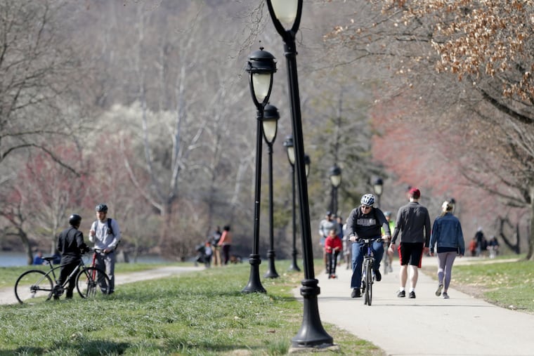People took to Kelly Drive to get out and exercise as the temperature climbed to 60 in Philadelphia, PA on Wednesday, March 18, 2020. The social distancing standard of six feet due to the spread of the coronavirus didn’t appear to stop people from gathering.