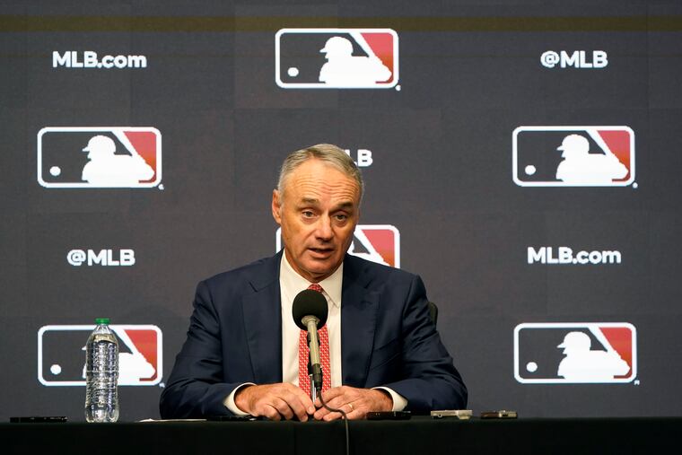 Major League Baseball commissioner Rob Manfred speaks during a news conference in Arlington, Texas on Thursday.