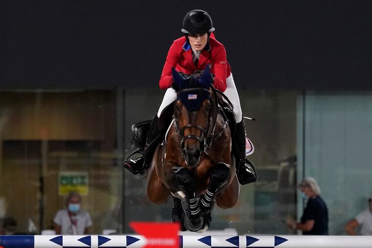 United States' Jessica Springsteen, riding Don Juan van de Donkhoeve, competes during the equestrian jumping individual qualifying at Equestrian Park in Tokyo on Tuesday.